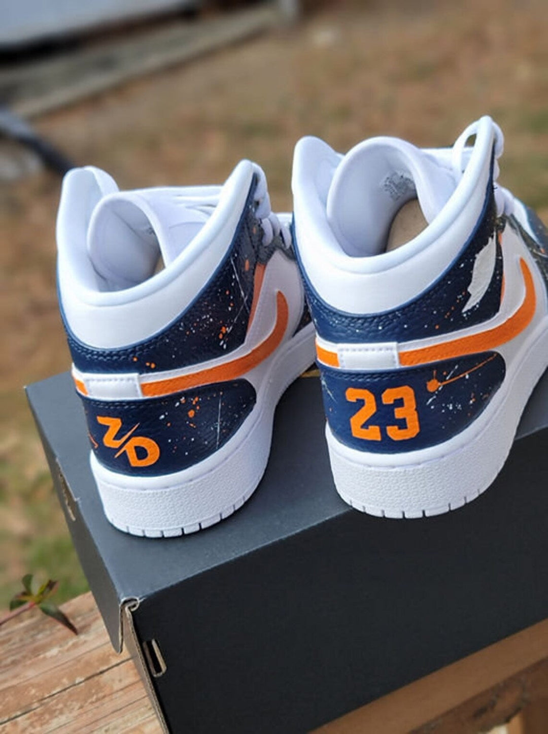 Custom Air Jordan 1 White Navy with Orange Splatter Pattern